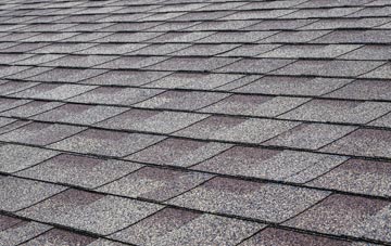 Central tiles for shallow pitch roofing
